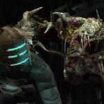 A necromorph lurks behind Isaac in Dead Space.