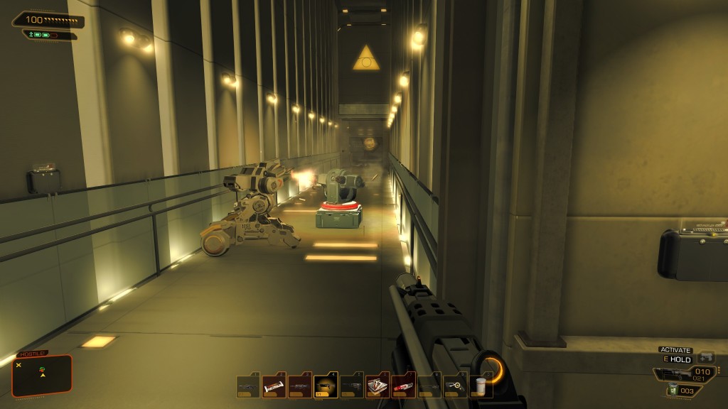 Deus Ex: Human Revolution - A turret battles a guard robot